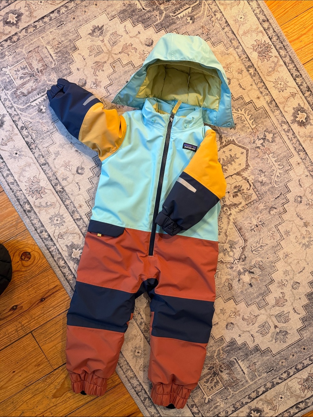 Patagonia Kids One-Piece Bodysuit in Light Blue, Yellow, Navy, Rust